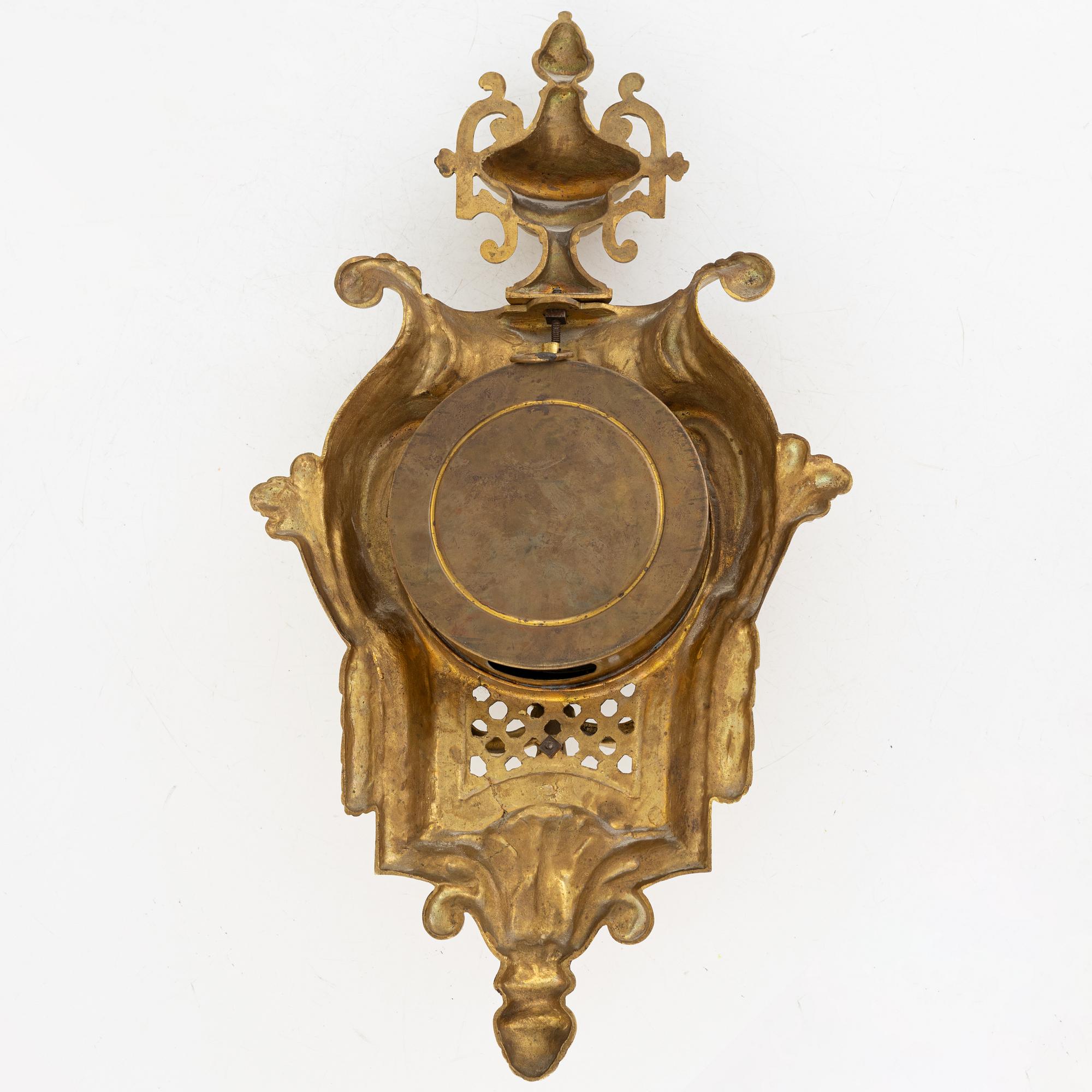 A Louis XVI-style wall clock, first half of the 20th Century.