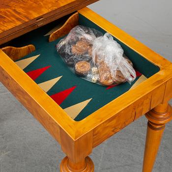 An early 20th Century birch card table.