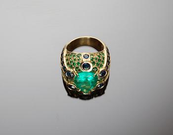 A Sazingg, Irene Zingg, large drop cut emerald, app. 8 cts, tsavorite and blue sapphire ring.