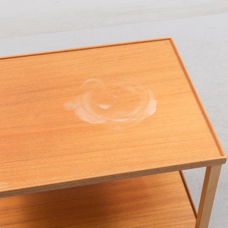 A mahogany veneer tea trolley designed in 1932 by Josef Frank for Firma Svenskt Tenn.