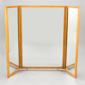 A 1950s three-part dressing mirror.