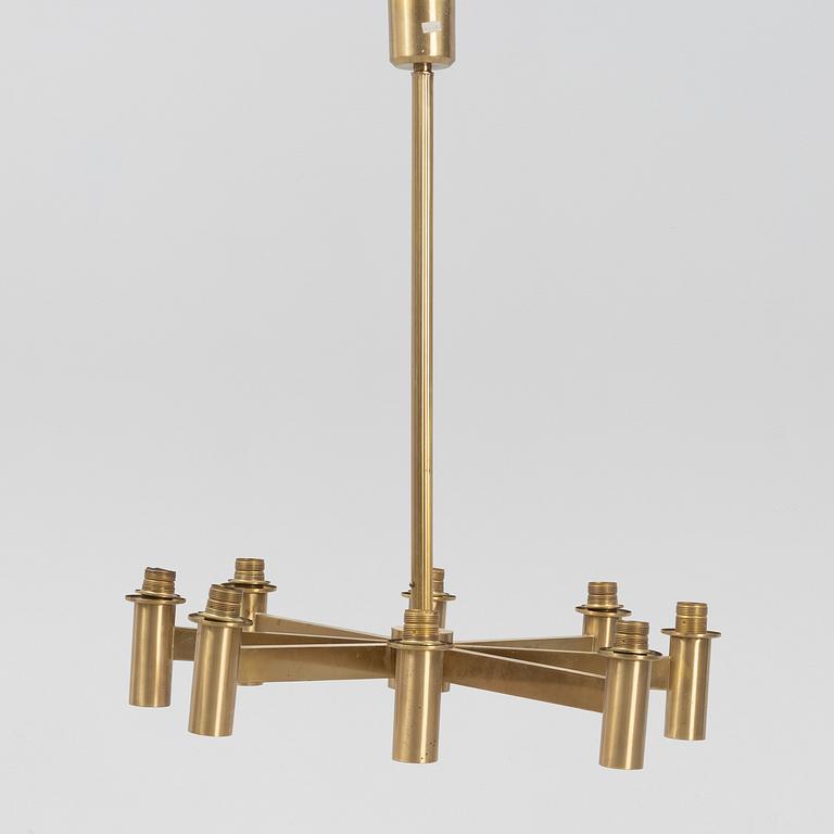 Hans-Agne Jakobsson, an eight-light brass ceiling light from Markaryd, Sweden.