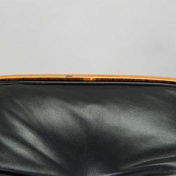 Charles & Ray Eames, 'Lounge chair' and ottoman, licensed by Mobilier International France, 1977.
