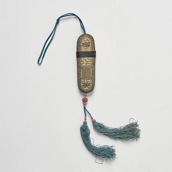 A set of three embroidered purses/ eye-glass cases, Qing dynasty, 19th century.