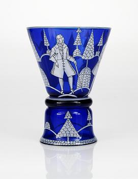 A Wiener Werkstätte blue glass goblet in a design by Josef Hoffmann. Signed WW.