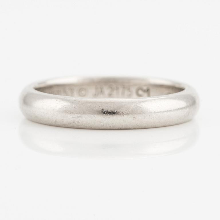 A Cartier platinum ring.