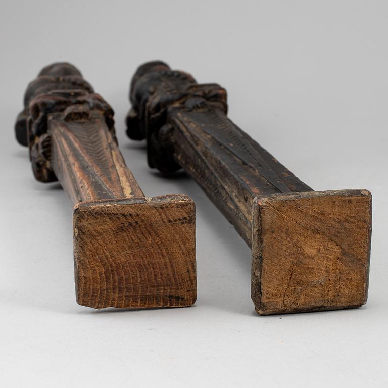 A pair of dark wood balusters, 18th century.