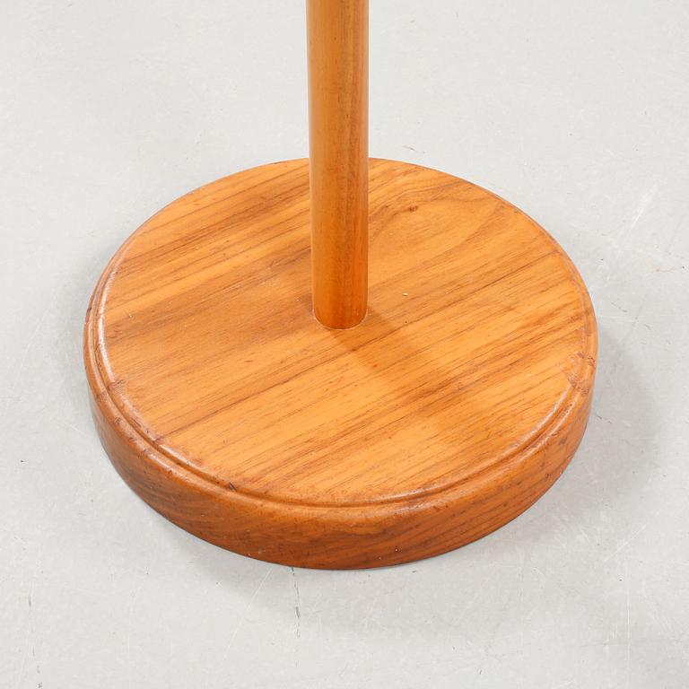 A floor lamp by carl Malmsten called "staken" from the second half of the 20th century.