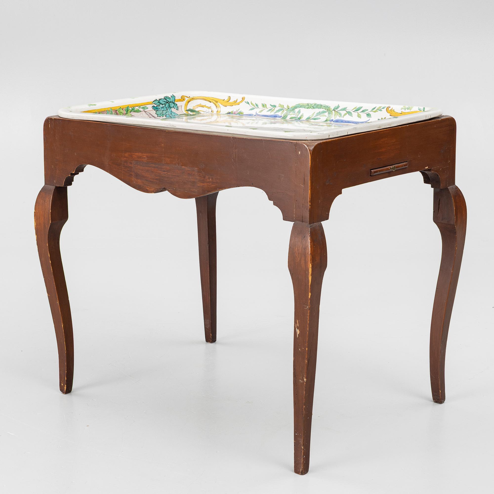 A Swedish rococo tea table with an associated top, 18th and 20th century.