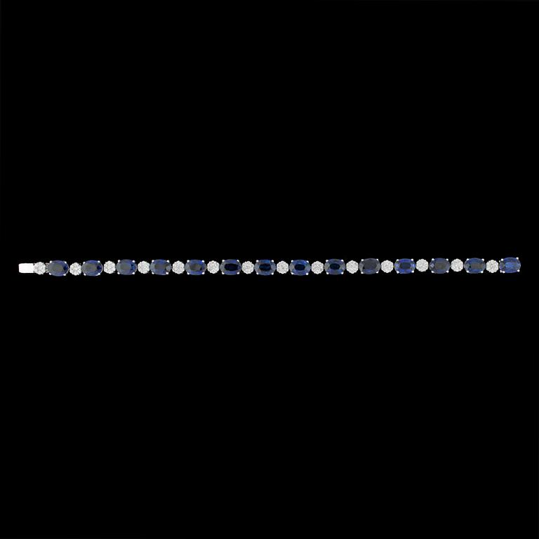 ARMBAND, fasettslipade blå safirer, 15.75 ct och briljantslipade diamanter, tot. 1.66 ct.