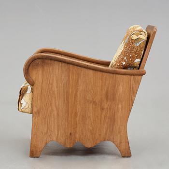 Axel Einar Hjorth, a stained pine "Lovö" armchair, Nordiska Kompaniet, Sweden 1930's.