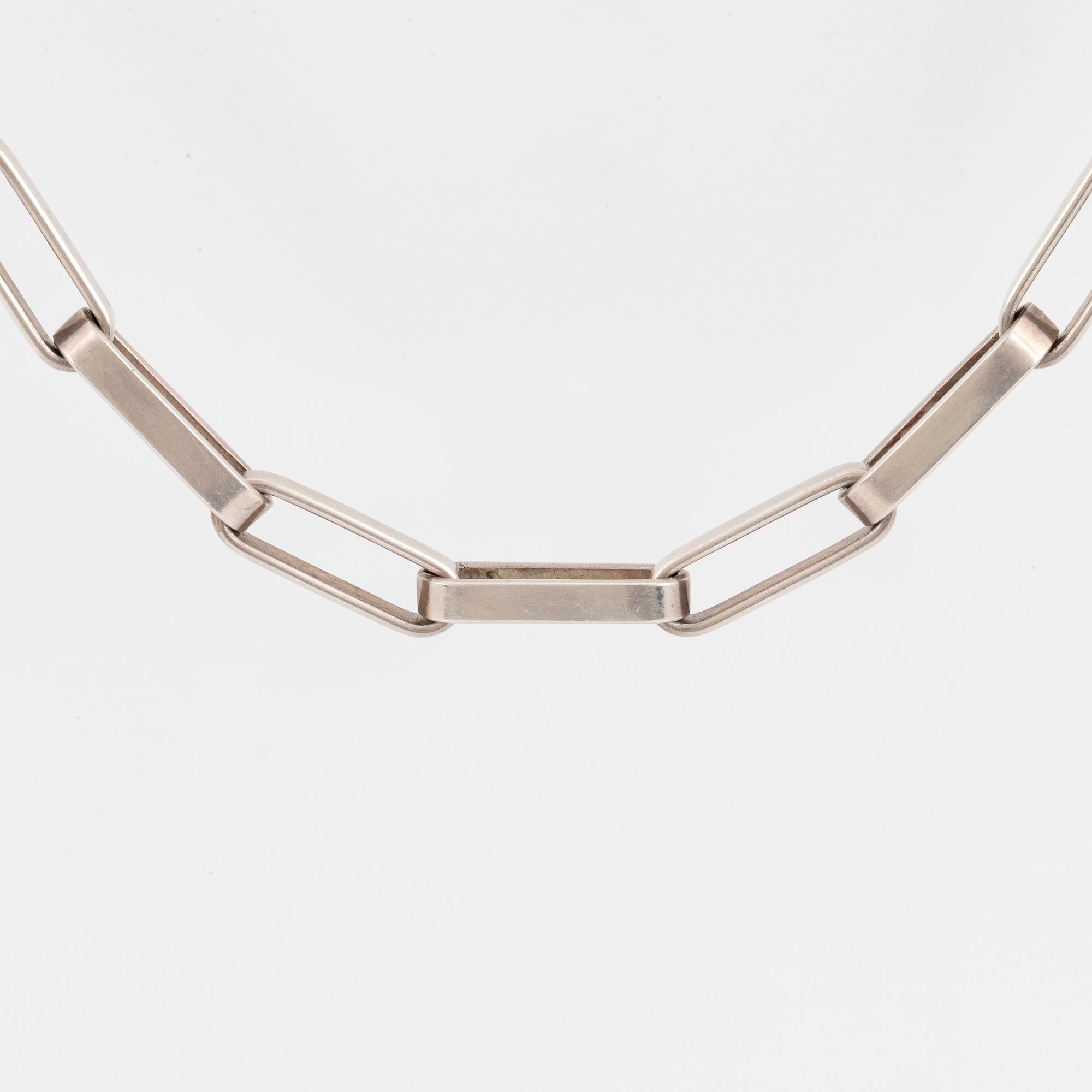 A Karl Ingemar Johansson necklace silver.