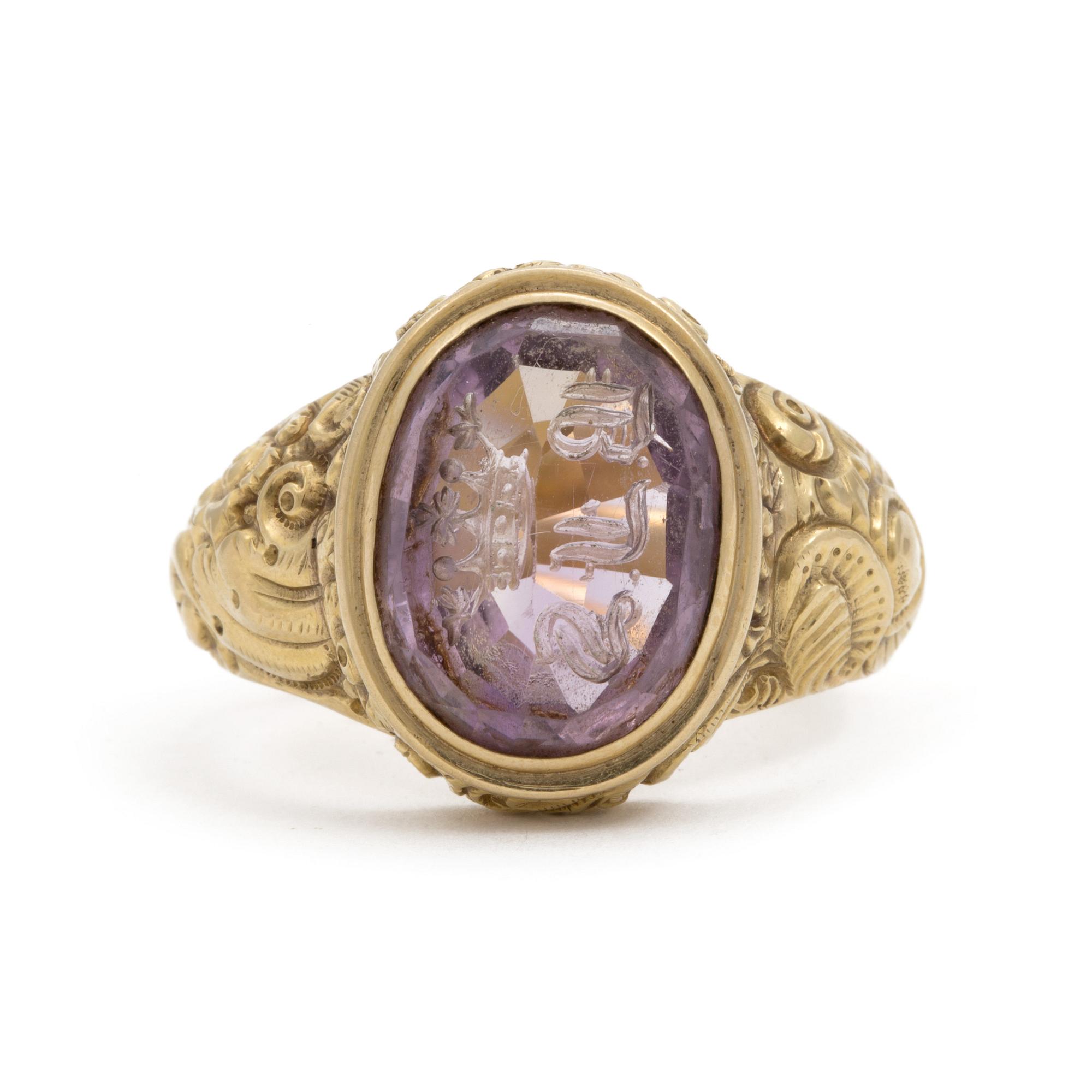 A signet ring set with amethyst.