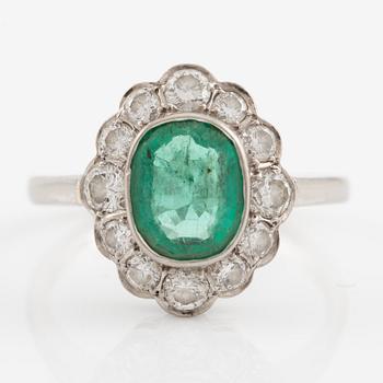 Ring 18K white gold with emerald and brilliant-cut diamonds.