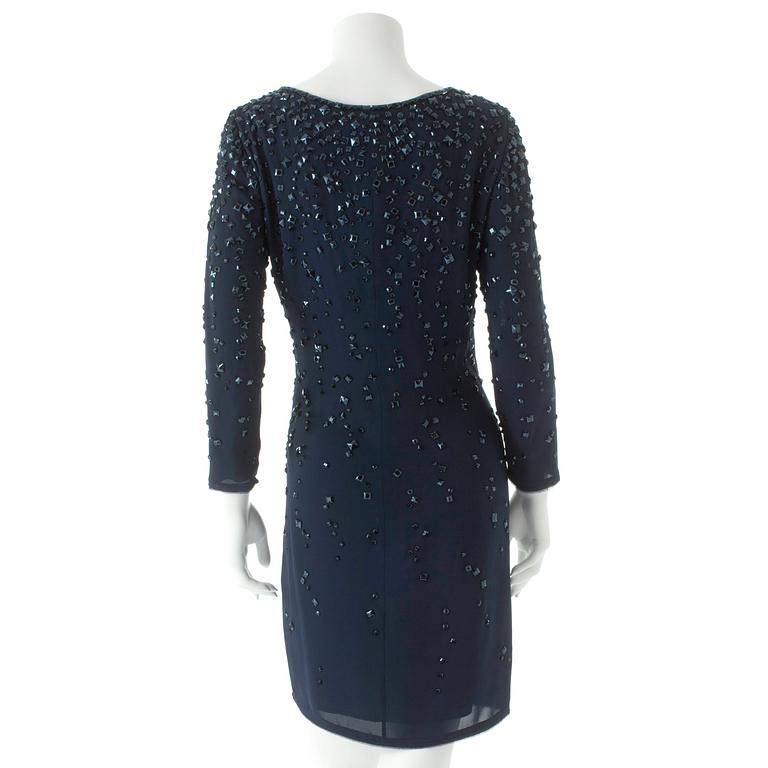 ESCADA, a darkblue silk cocktail dress with black decorative glasspearls.