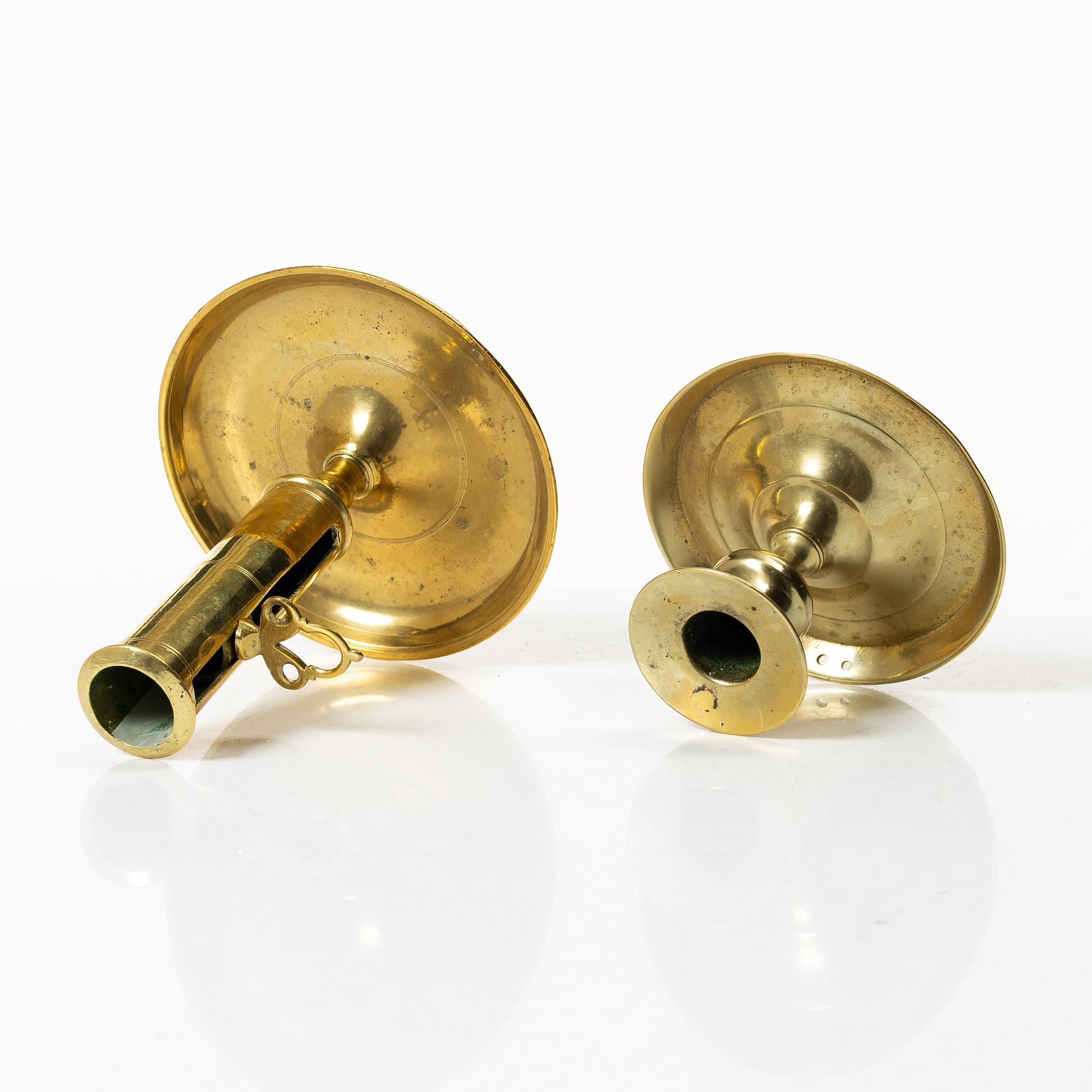 Candelabra, 4 pcs, and a chamberstick for two candles, brass, 19th century.