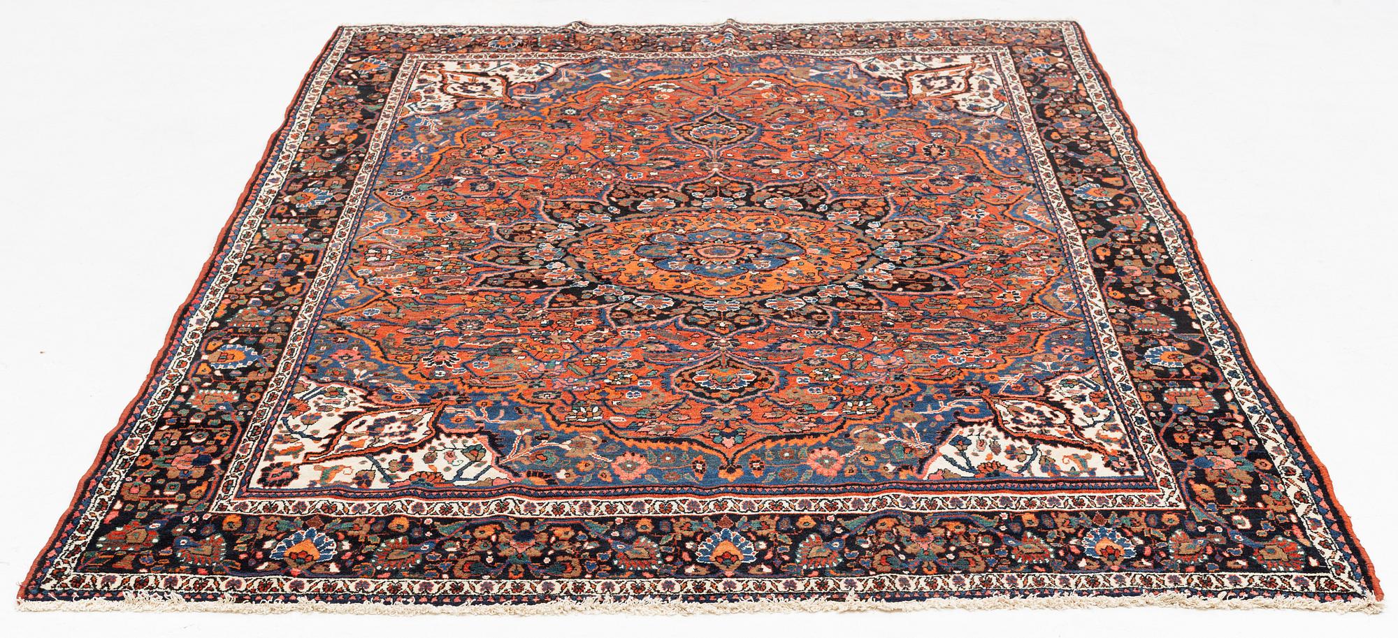 A semi-antique Abadeh carpet, approximately 296 x 191-196 cm.