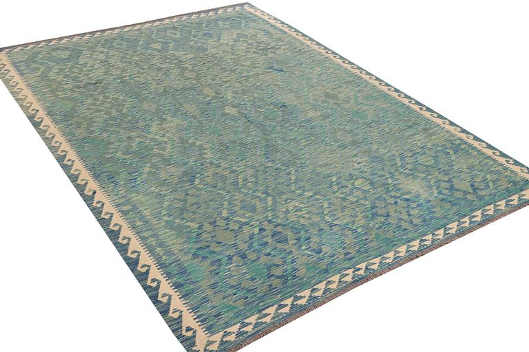 An Afghan kelim carpet, c. 293 x 214 cm.