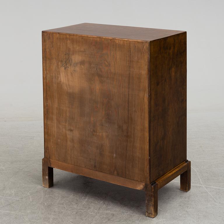 AXEL LARSSON, a stained birch chest of drawers from Svenska Möbelfabriken, 1930's.