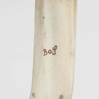 A reindeer horn knife by Bo Sunna, signed.