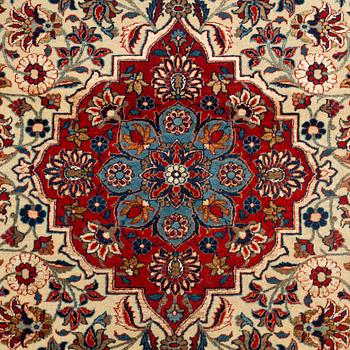 A rug, semi-antique, Teheran, part silk, 204 x 132 cm.