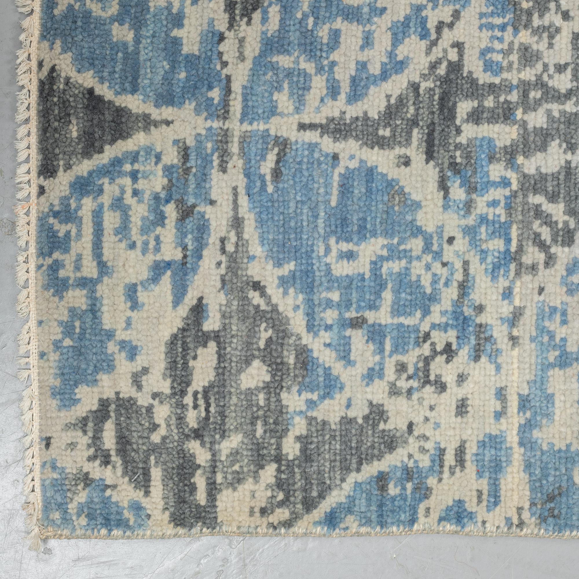 A carpet, oriental, ca 305 x 246 cm.