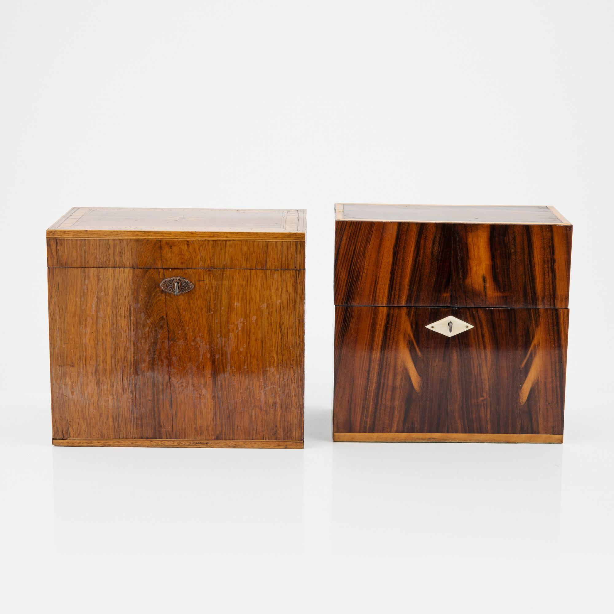A set of two chests, one with four bottles, 20th Century.