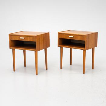 A pair of teak veneered bedside tables, second half of the 20th Century.