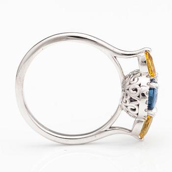 A 14K white gold ring with brilliant cut diamonds ca. 0.07 ct in total and sapphires.