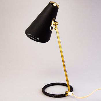 A mid-20th-century table lamp, model  K11-15 for Idman, Finland.