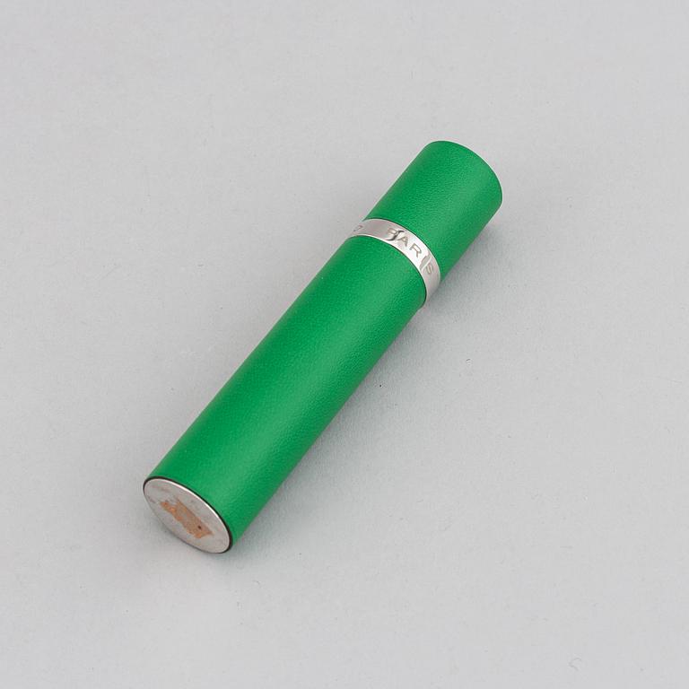 Hermès, refillable perfume bottle in leather.