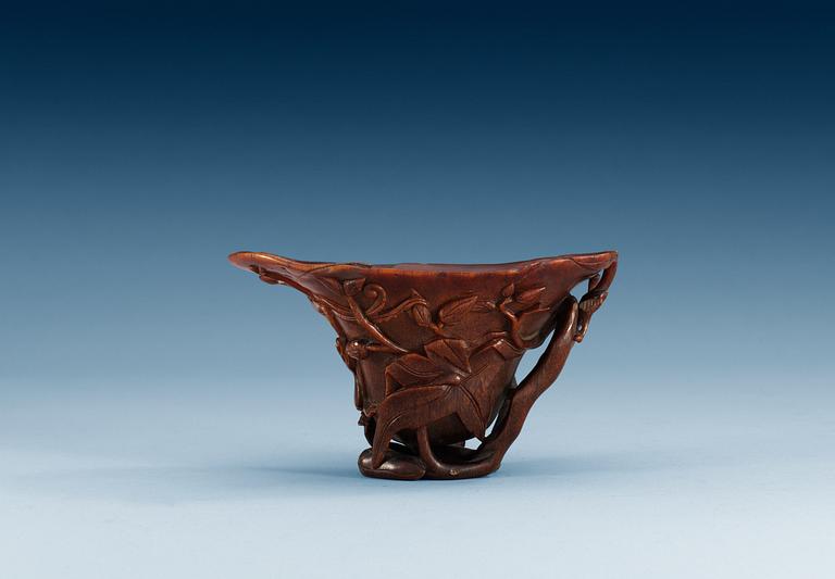 A rhinoceros horn libation cup, Qing dynasty, Kangxi (1662-1722).