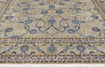A Royal Keshan carpet, signed, 410 x 307 cm.