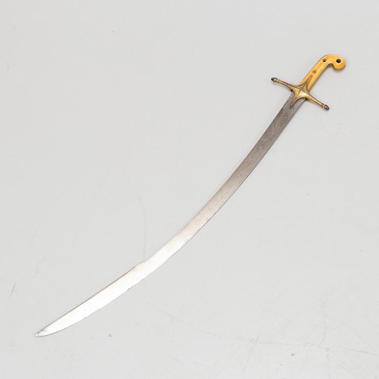 A Turkish Kilij sword, with scabbard, from around the year 1900.