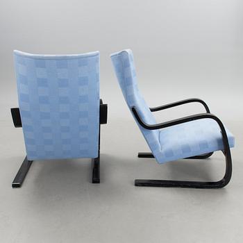 A pair of mid 20th century '36/401' armchairs for Artek, Finland.