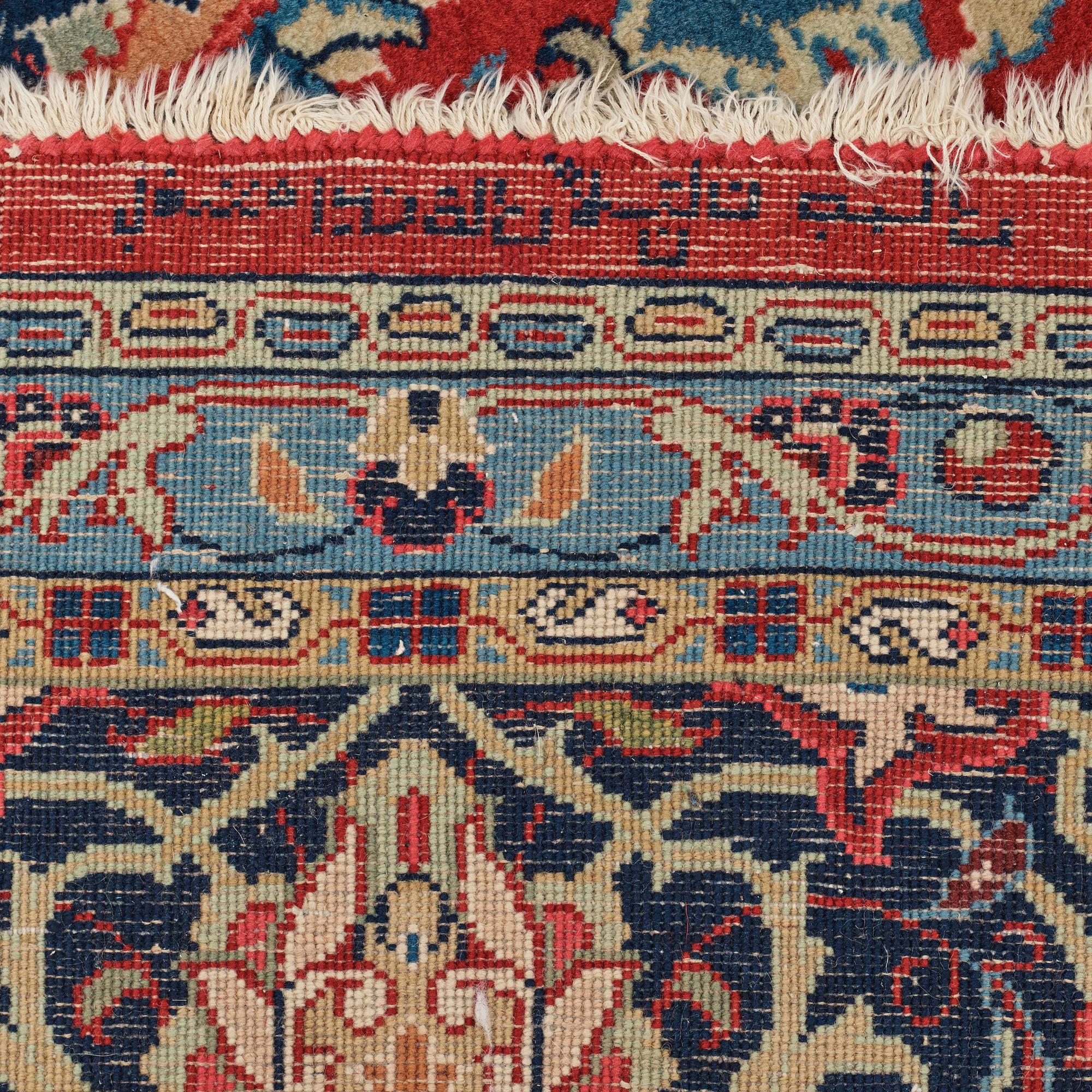 A carpet, a semi-antique/an old Persian, probably a Qazvin, ca 345-349 x 251,5-253 cm.