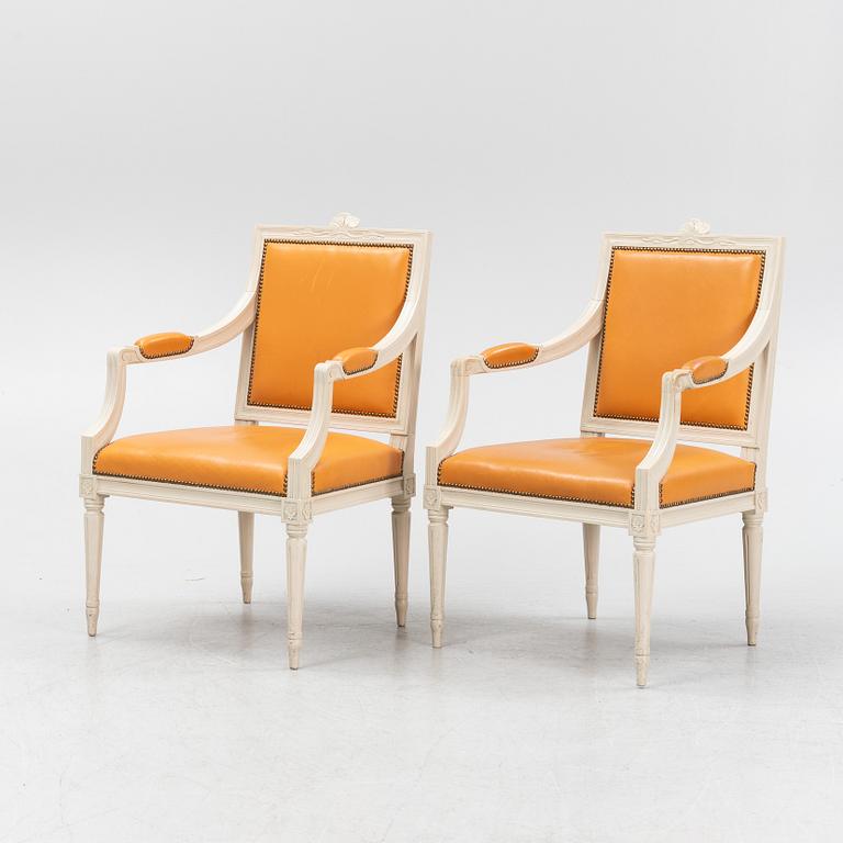 A pair of Gustavian style armchairs, end of the 20th Century.