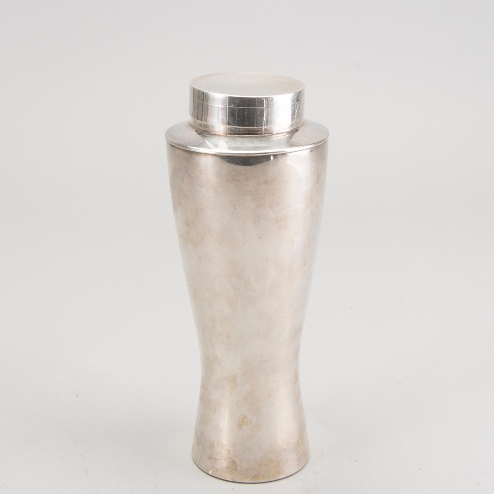 A set of 12 silver plated cocktail glasses and a shaker mark By CG Hallberg Stockholm mid 1900s.