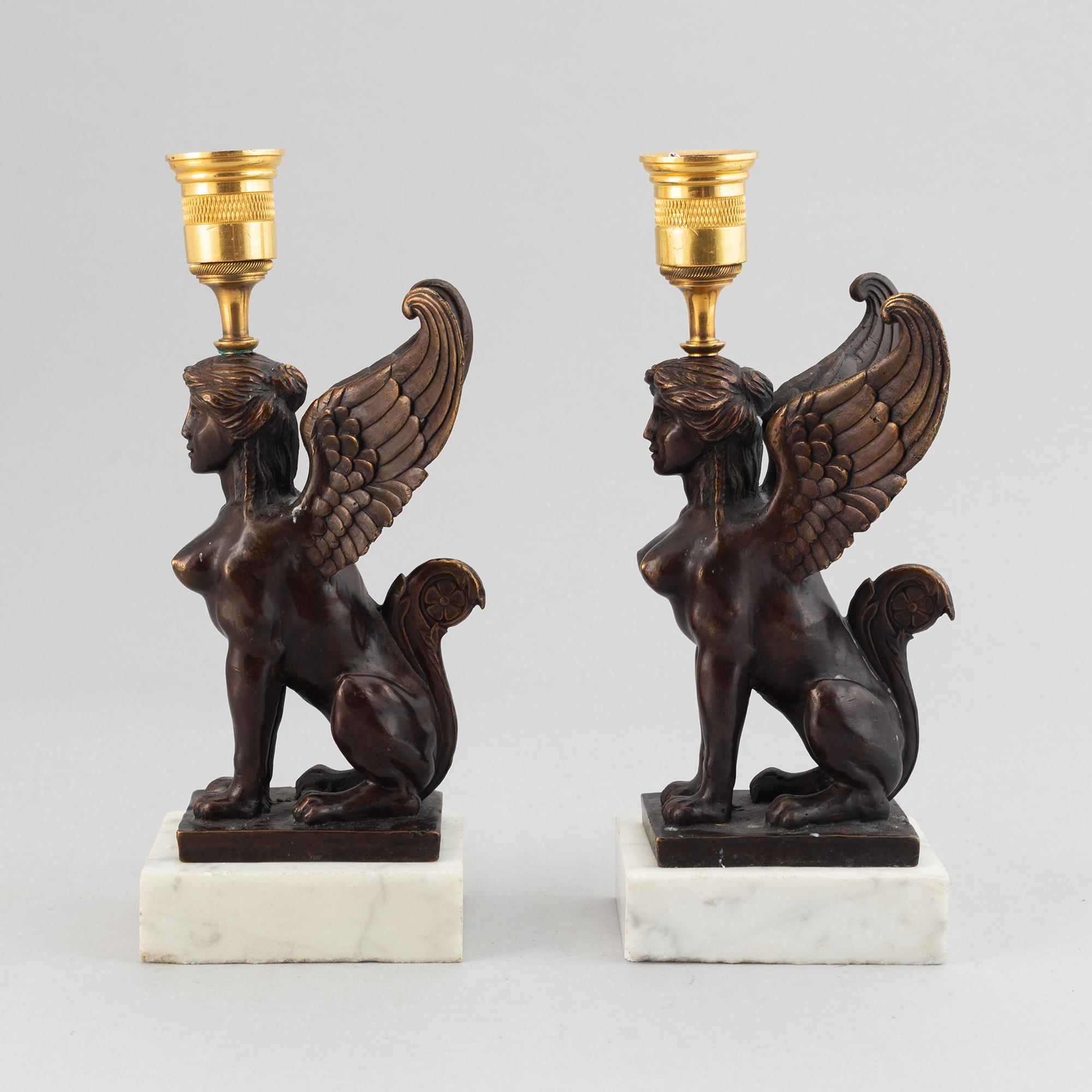A pair of presumably Russian Empire candlesticks, early 19th Century.