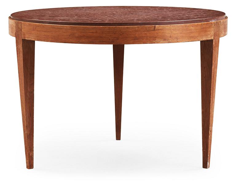 A Josef Frank mahogany and limestone table, Svenskt Tenn.