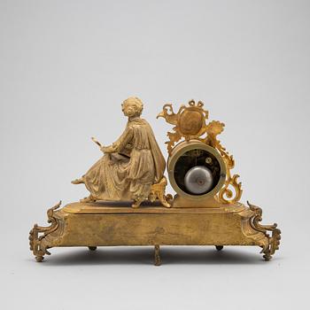 A Louis XVI-style ormolu and parcel gilt mantel clock, mid 19th Century.