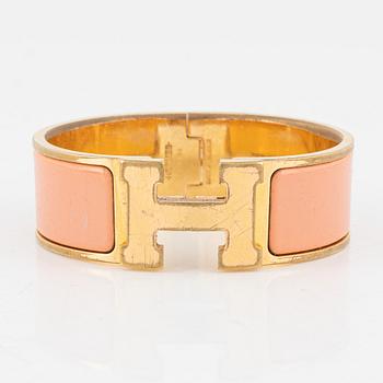 Hermès, a 'Clic Clac H' bracelet.