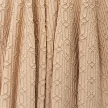 Alaïa, a beige patterned dress, size 36.