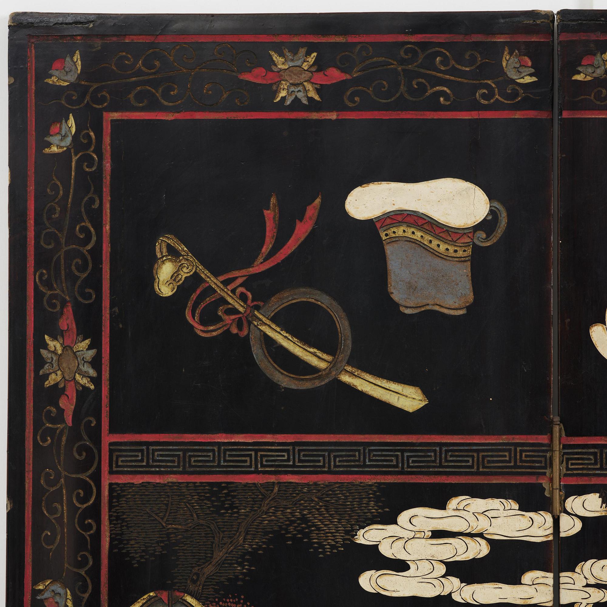 A Chinese four panel lacquer folding screen, first part of the 20th century.