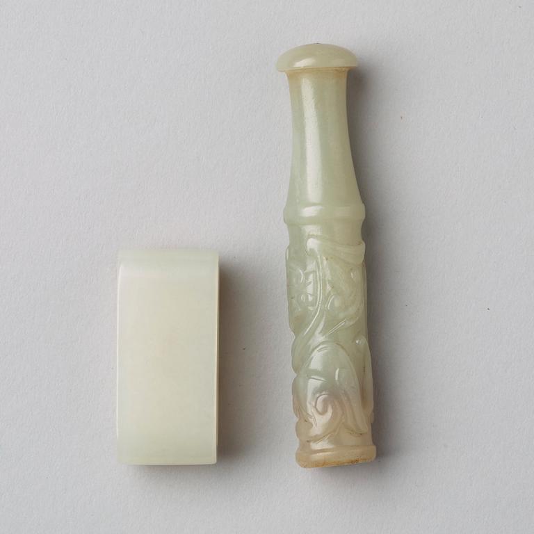 A nephrite scabbard part and a sculptured object, Qing dynasty or older.