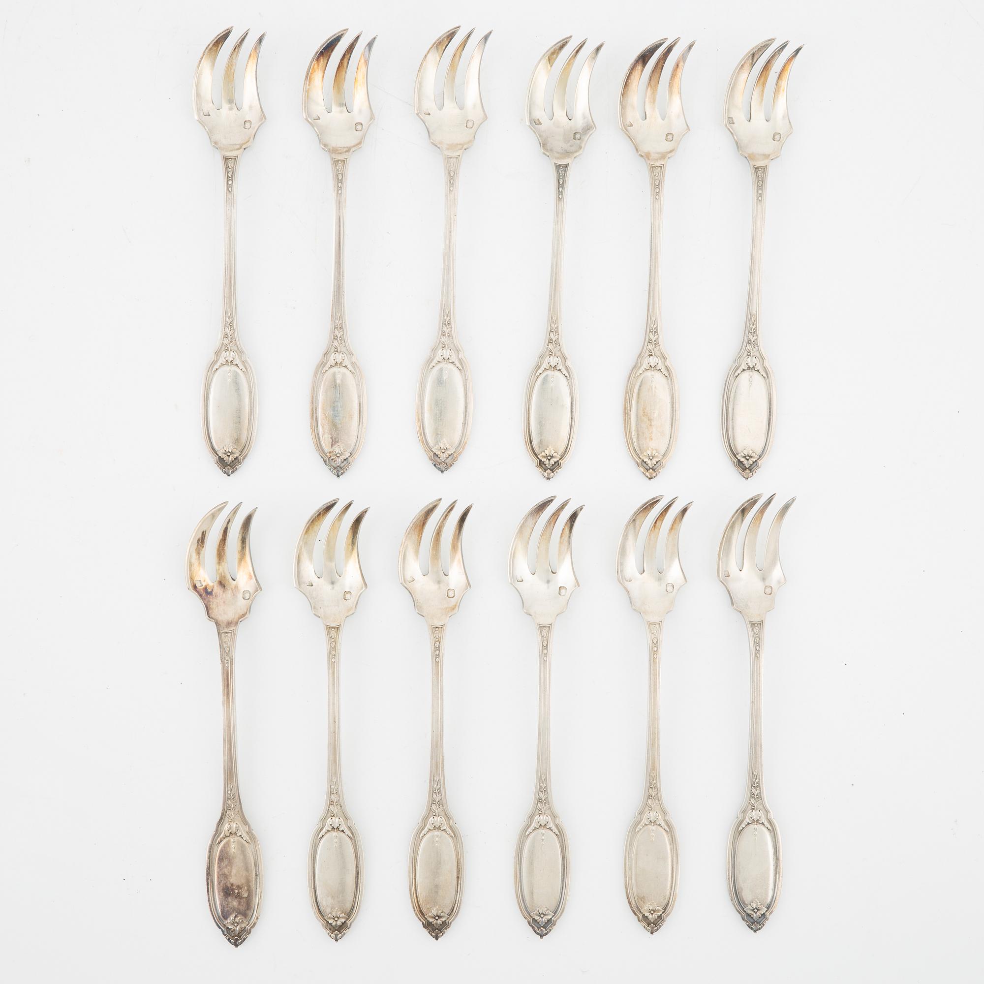 Claude Doutre Roussel, ostrongafflar, 12 st, silver, Paris, omkring 1900.