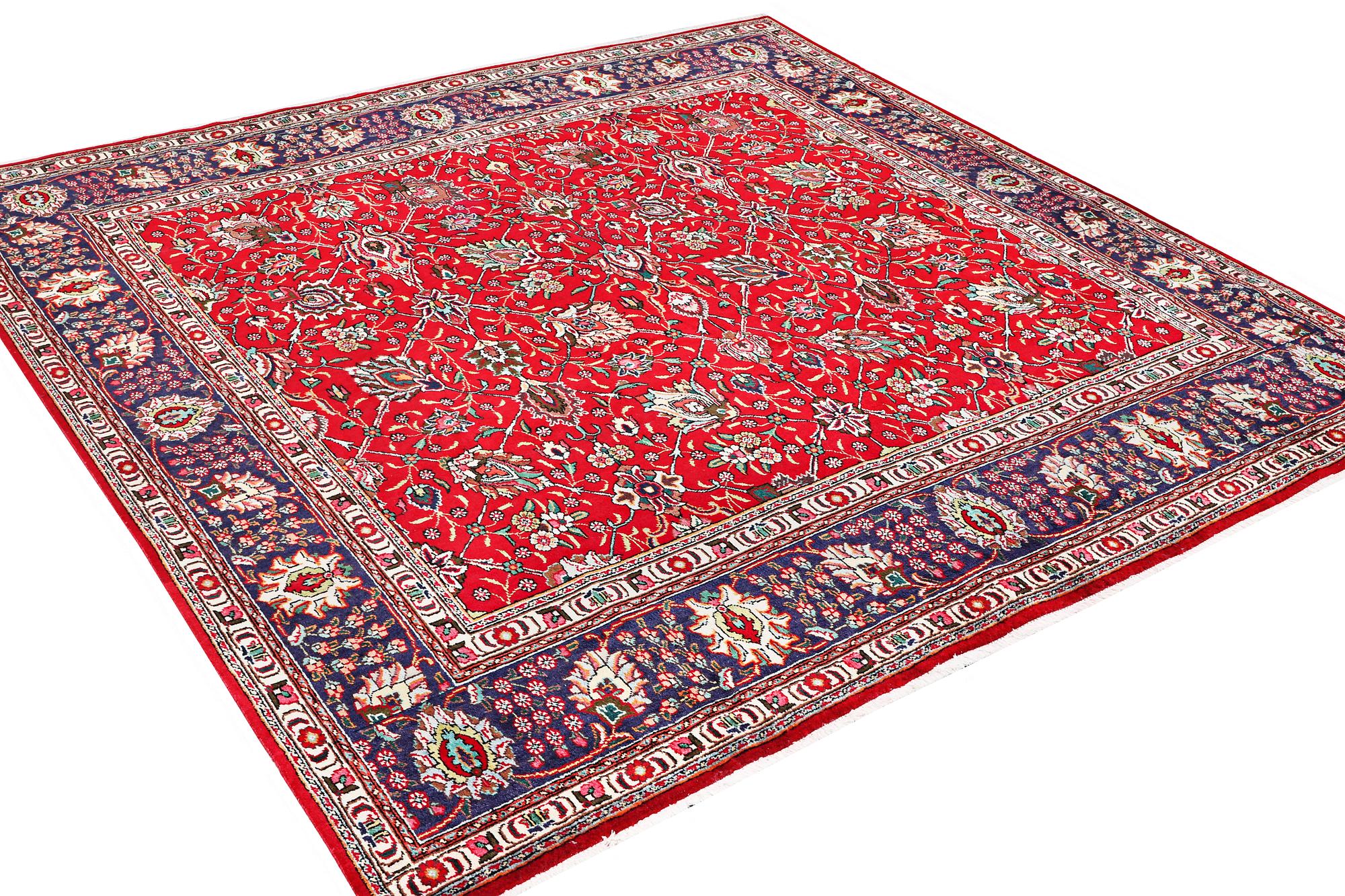 A Tabriz carpet, c. 302 x 294 cm.