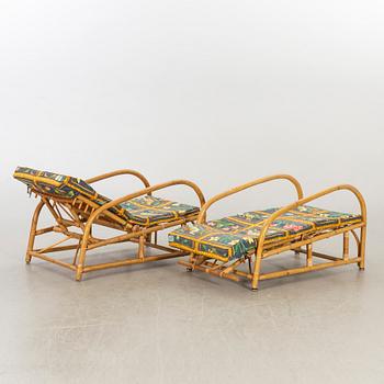 A PAIR OF EASY CHAIRS MID 20TH CENTURY.