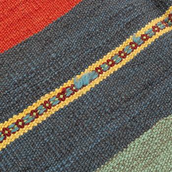 A persian kilim,  ca 242 x 181 cm.