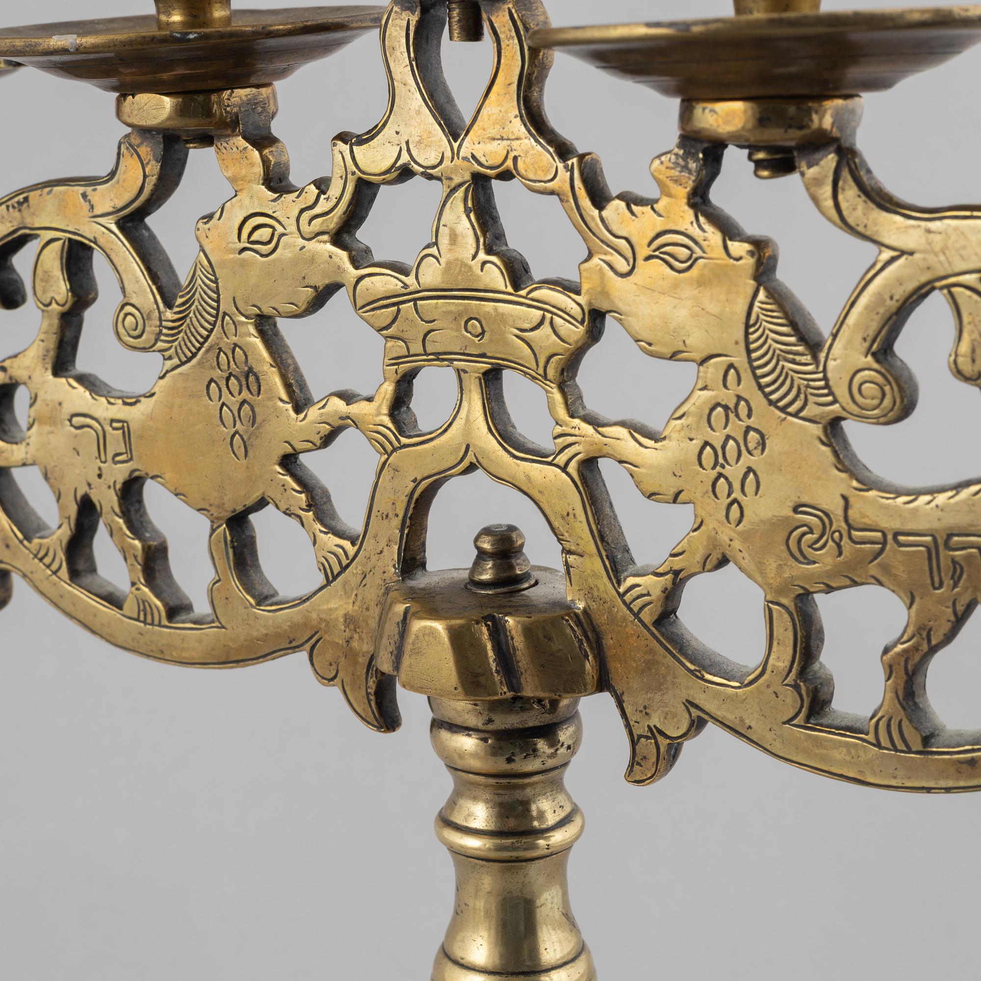 A brass Baroque style candelabra, 18th/19th century.
